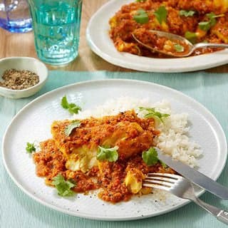 Macher Jhol: A Bengali Fish Curry Delight
